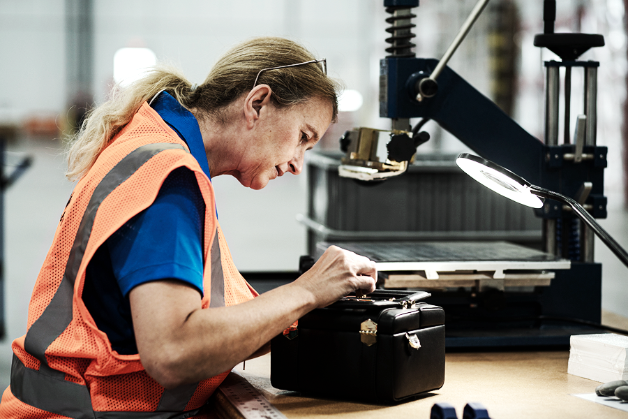 Ryder employee packaging a product