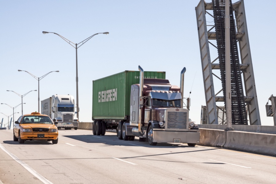 2026 Freight Market & Trucking Industry Trends Semi trucks leaving the Port of Miami highlighting trucking industry trends in freight movement