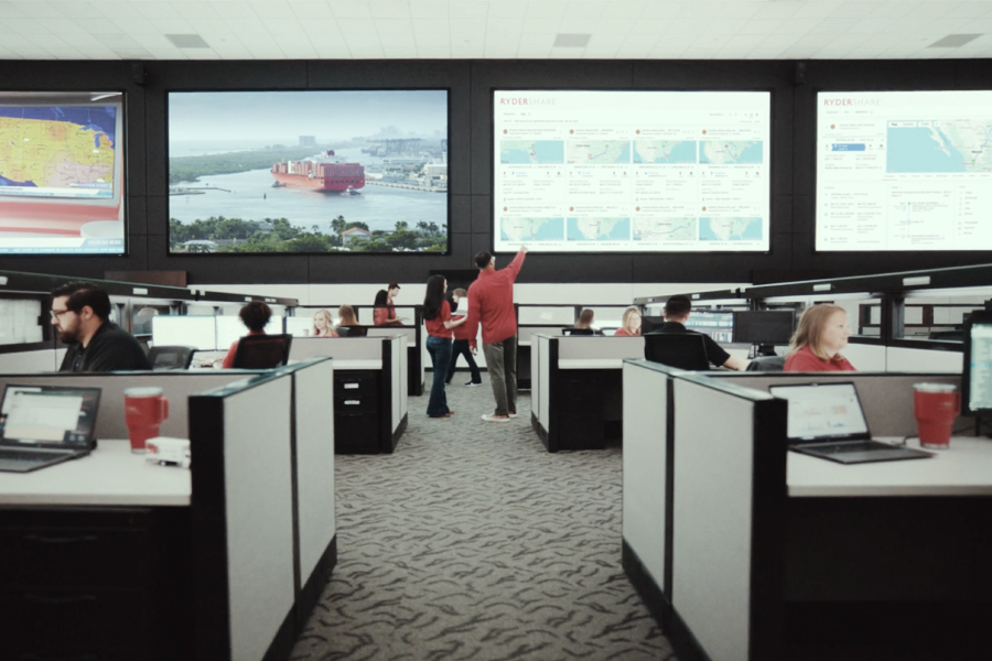 Ryder employees making sure the Rydershare technology platform runs smoothly