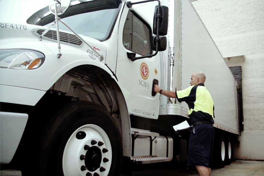A customer getting into his Ryder semi-truck