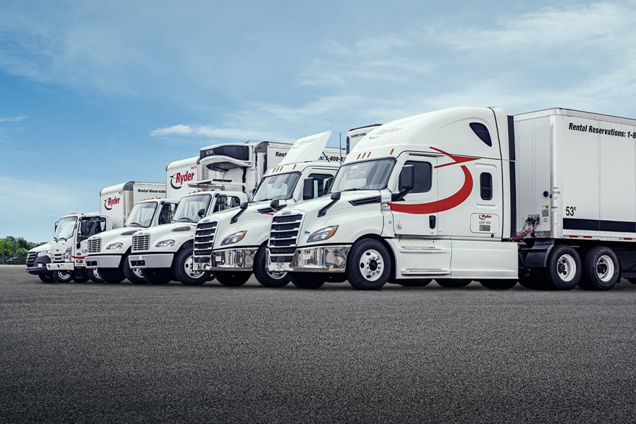 Different types of Ryder trucks and vans lined up together