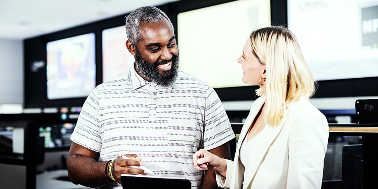 A ryder employee showing a customer how to use our truck leasing TCO tool