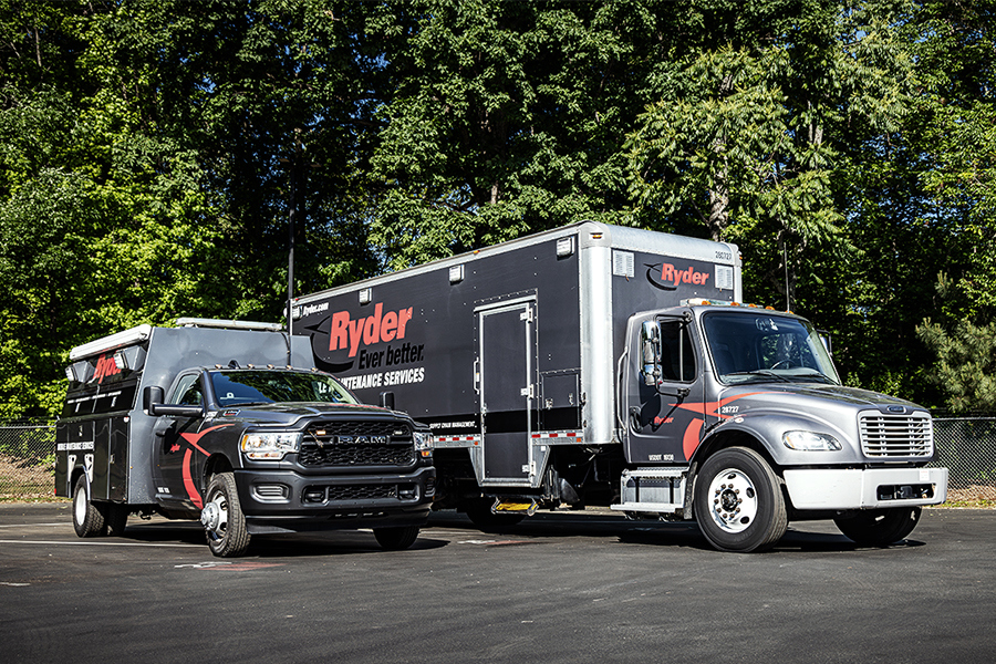 Two Ryder mobile maintenance trucks lined up