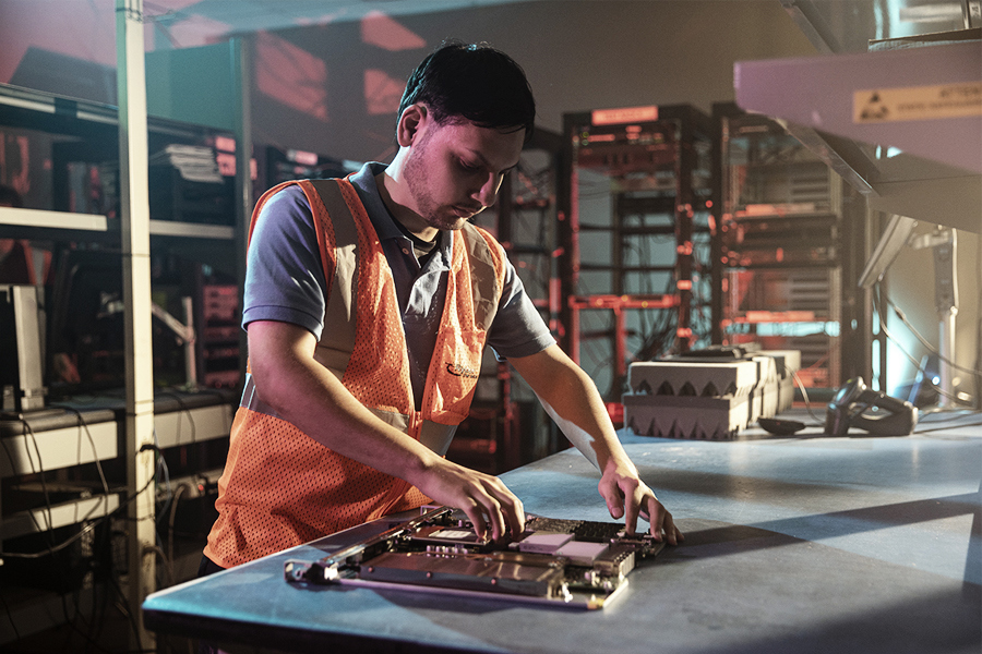 A Ryder contract assembly technician building a computer A Ryder contract assembly technician building a computer