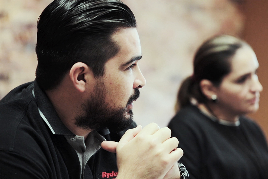 close-up image of two people sitting side by side
