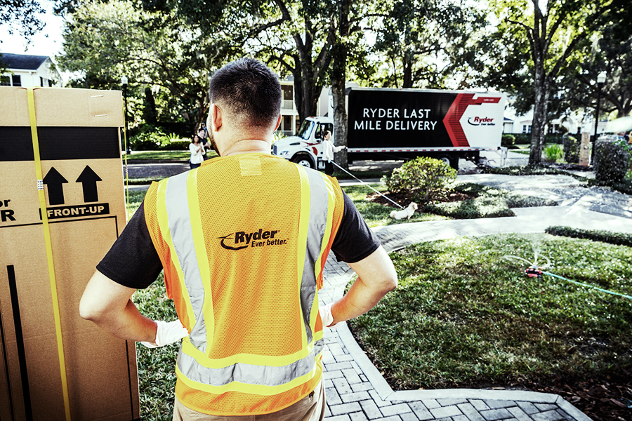 Ryder employee completing a white glove delivery