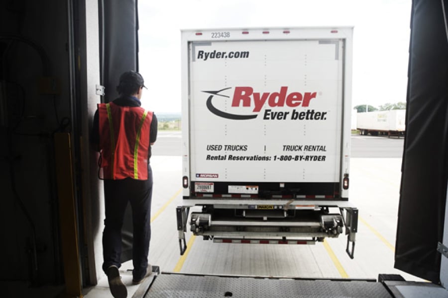 truck backing up to warehouse