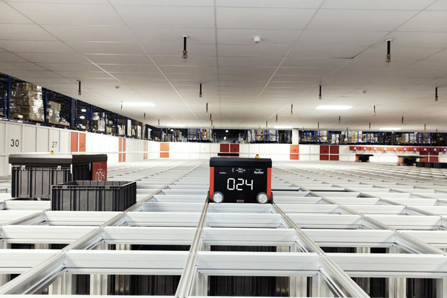 Automated storage and retrieval system (AS/RS) with high-density racking Automated storage and retrieval system (AS/RS) with high-density racking