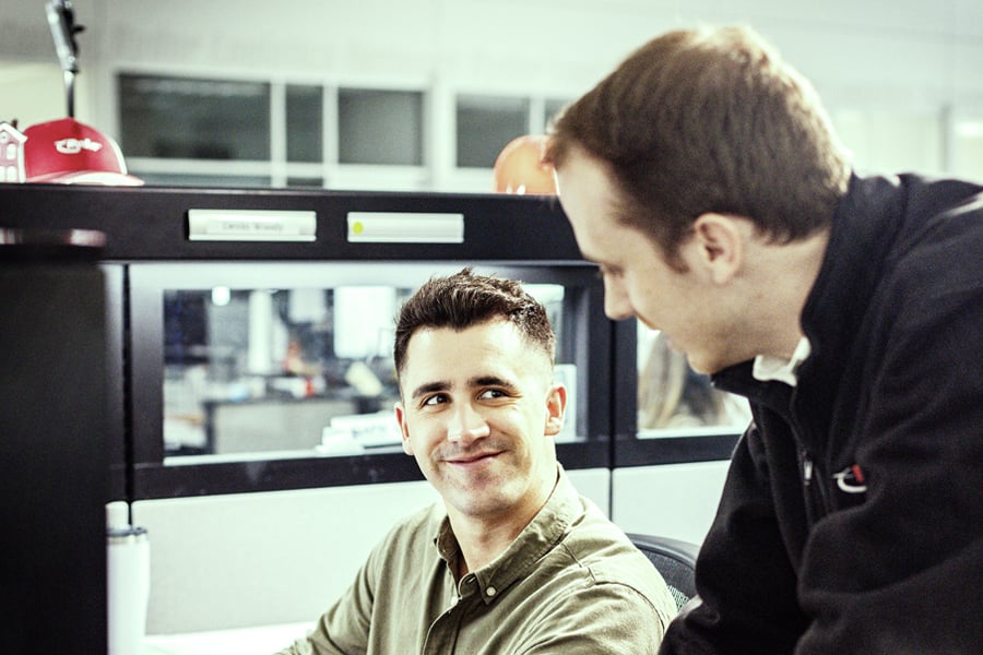 Two Ryder employees collaborating at Ryder's new Baton technology lab