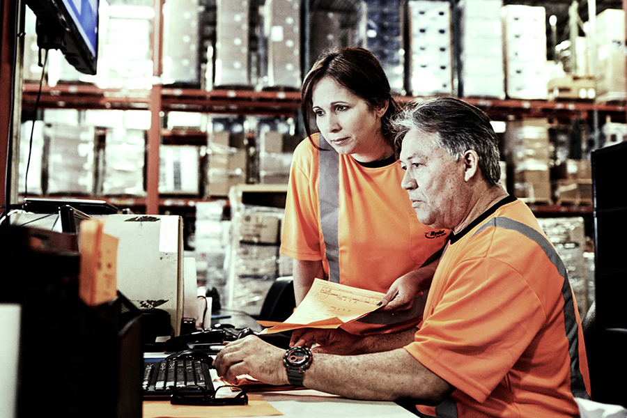 Ryder employees collaborating to ensure ease of use on Rydershare