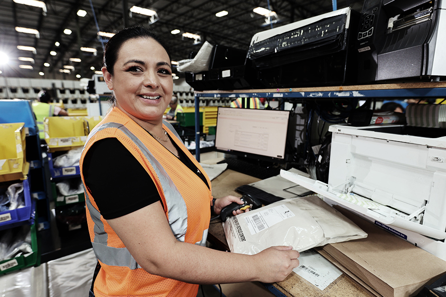 Ryder warehouse employee sorting returns  Ryder warehouse employee sorting returns