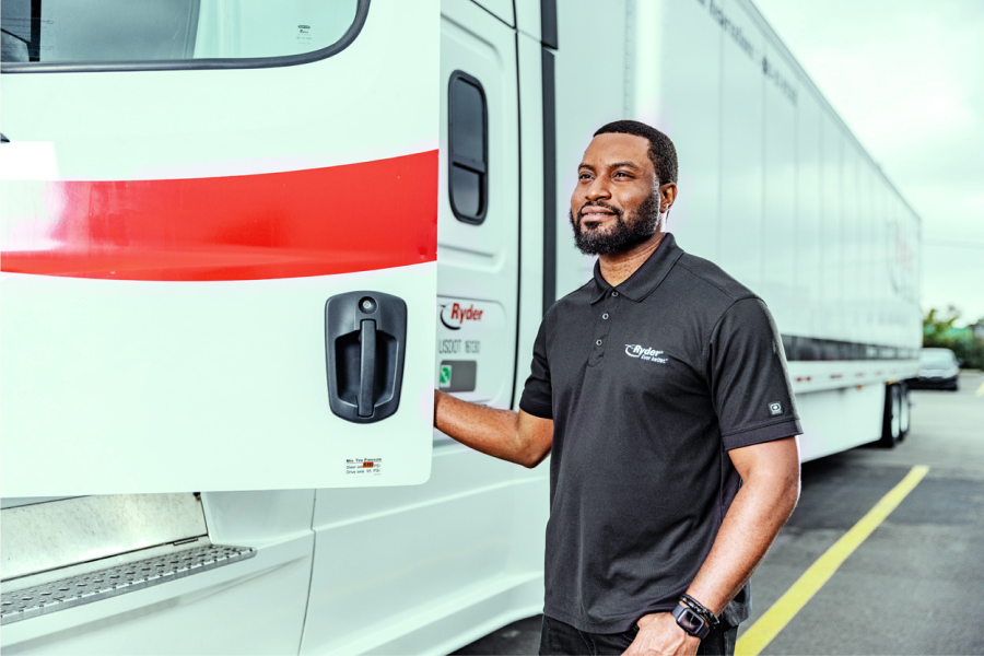 Dedicated transportation driver stepping into truck